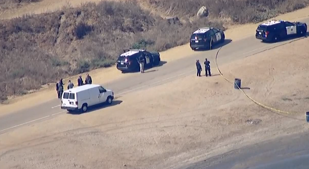 This photo shows San Diego Police Department detectives responding to a murder at Fiesta Island on Oct. 2, 2024