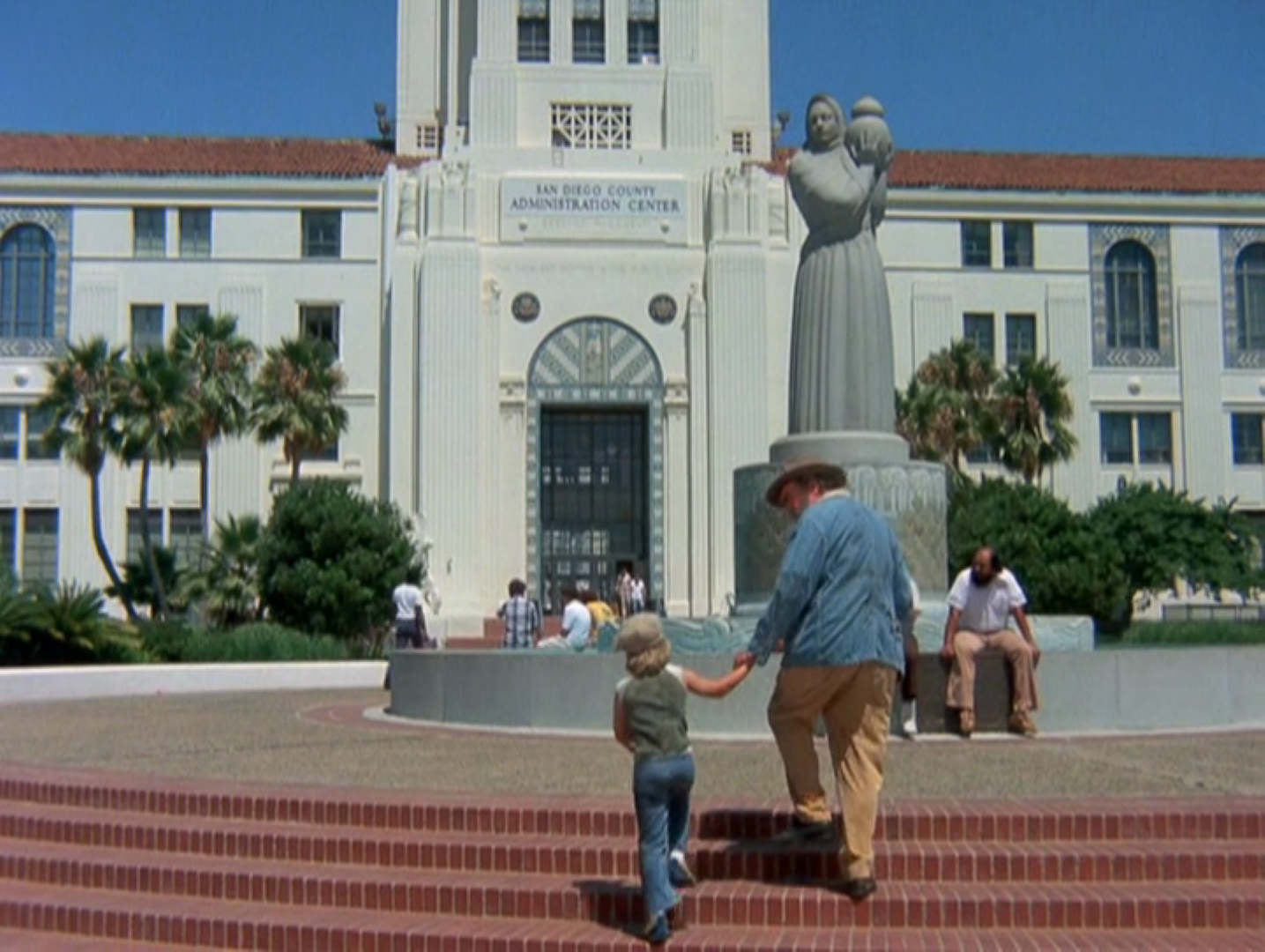 From “Eight is Enough”:  Actors Adam Rich and Jack Elam in front of the San Diego County Administration Building, 1978